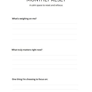 May include: A white planner page with the text "MONTHLY RESET" and the tagline "A calm space to reset and refocus." It includes prompts: "What's weighing on me?", "What truly matters right now?", and "One thing I'm choosing to focus on:"