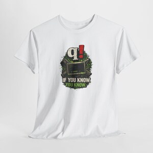 May include: White t-shirt with a graphic design featuring a stylized "q" and an exclamation mark, a computer screen, and the text "IF YOU KNOW, YOU KNOW." The design has green and red accents.