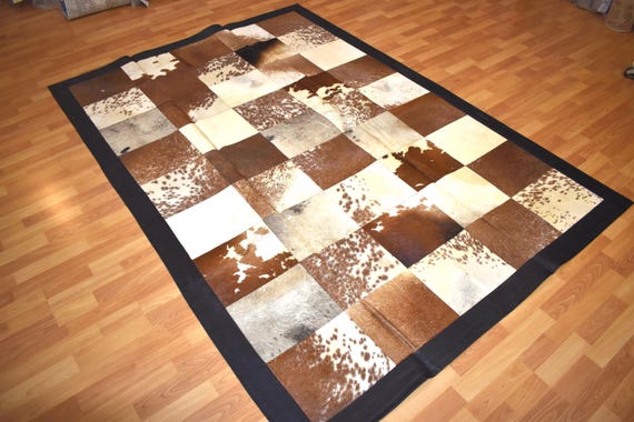 Hand Stitched Cowhide Patchwork Rug, Rustic Farmhouse Leather Carpet (5.57 x 7.87 ft)