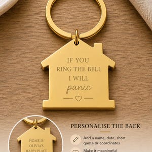 May include: Gold-colored house-shaped keychain with a ring. The keychain has the text "IF YOU RING THE BELL I WILL panic" engraved on it. A smaller keychain shows the text "HOME IS OLIVIA'S HAPPY PLACE". The image also includes text about personalization.