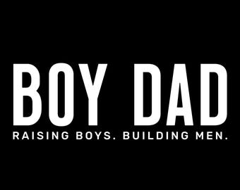 May include: A black background with the words "BOY DAD" in large, bold, white letters. Below, smaller white text reads "RAISING BOYS. BUILDING MEN."
