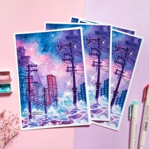 Op de afbeelding: Een set van vier aquarelprints met een stadsbeeld met stroomleidingen en gebouwen die onder water staan. De lucht is fel roze en paars met witte sterren. De prints hebben een witte rand en de tekst "MOONCHU" is zichtbaar in de linkerbenedenhoek.