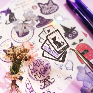 this photo features a stately cat card set sticker from the stationery sheet. moonchu original art sticker sheet as a love letter to black cats. features several black cat text, including black cats are good luck and i love black cats forever, as well as black cats with witch hats, paw prints, crystal ball, cat ghosts etc.