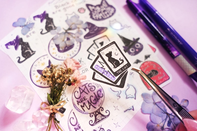 this photo features a stately cat card set sticker from the stationery sheet. moonchu original art sticker sheet as a love letter to black cats. features several black cat text, including black cats are good luck and i love black cats forever, as well as black cats with witch hats, paw prints, crystal ball, cat ghosts etc.