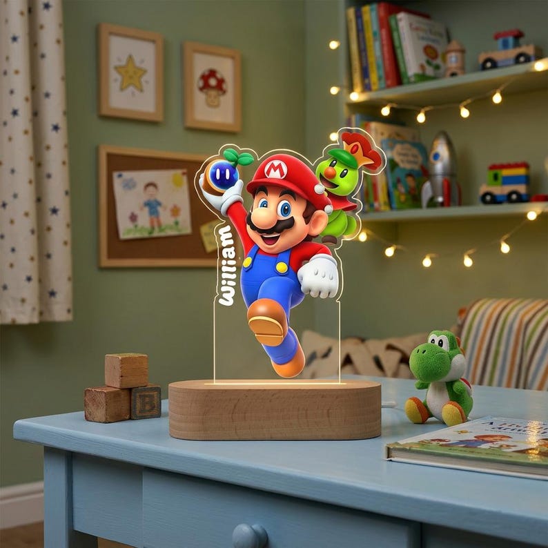 May include: A custom acrylic LED night light featuring a colorful graphic of Mario holding a blue item with a green sprout, accompanied by a green character. The name William is printed vertically on the acrylic, set on a light wood base.