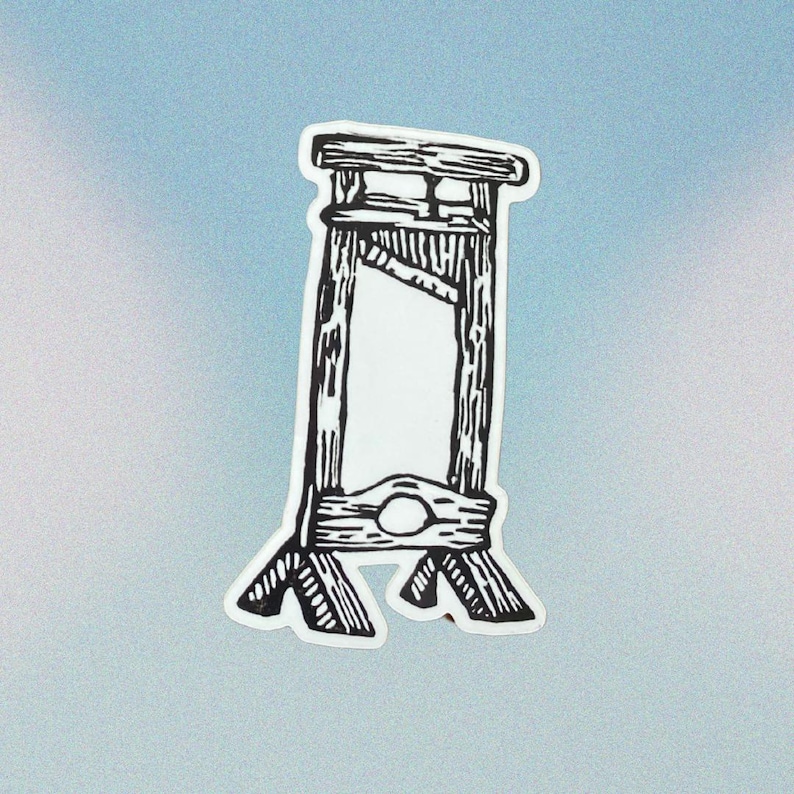 May include: A black and white sticker featuring a guillotine. The illustration depicts the wooden structure with a blade, set against a light blue background. The design is a simple, graphic representation of the historical execution device.