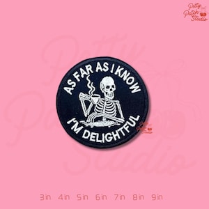 May include: A white ceramic mug with a black handle and the text "But First, Coffee" in a black, bold font. The mug is on a white surface. The mug is approximately 4 inches tall.