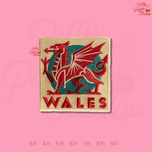 May include: Embroidered patch featuring a red Welsh dragon on a teal background, with the word "WALES" in red. The patch is square, with a beige border. Sizes range from 3 inches to 9 inches.
