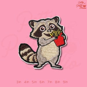 May include: Embroidered patch featuring a raccoon holding a red container of french fries. The raccoon has brown and gray fur with a striped tail. The patch has a white border and the text "Petty Patch Studio".