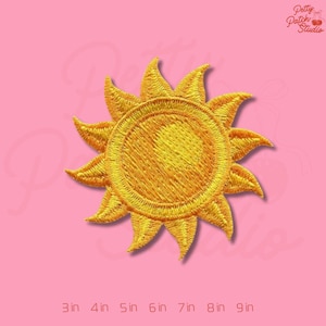 May include: Embroidered yellow sun patch with detailed stitching. The sun has a circular center and pointed rays. The patch is shown against a pink background with size indicators from 3 to 9 inches.