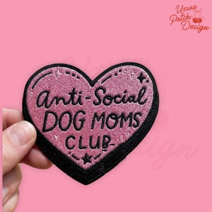 May include: A set of three ceramic mugs with a speckled, matte finish. The mugs are in shades of cream, light gray, and dark gray. Each mug has a simple, minimalist design and a rounded handle. The mugs are stacked on top of each other.