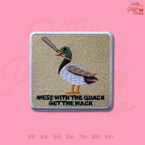 May include: Embroidered patch featuring a duck with a baseball bat, text reads "MESS WITH THE QUACK GET THE WACK." The patch is square with a tan background and white border. The duck has green, brown, and white feathers.
