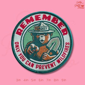 May include: Embroidered patch featuring Smokey Bear, holding a shovel and pointing. The patch is circular with the text "REMEMBER, ONLY YOU CAN PREVENT WILDFIRES." The design includes a green background and a brown bear. Available in sizes from 3 inches to 9 inches.