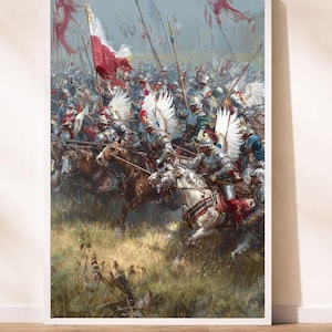 Puede incluir: Impresión enmarcada de una escena de batalla histórica. La obra representa una carga de caballería con soldados con armaduras ornamentadas, montados a caballo. Se ven banderas polacas, y la paleta de colores incluye tonos de gris, rojo y blanco.
