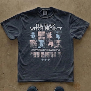 Vintage horror movie t-shirt inspired by The Blair Witch Project, found footage horror graphic design, distressed retro print, unisex Comfort Colors 1717 shirt, cult horror film fan apparel.