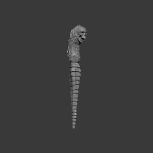 May include: A gray, stylized sculpture of a staff or wand. The top features a detailed skull, with a spine-like design extending down the length. The staff has a segmented, textured appearance, suggesting a bone or skeletal theme.