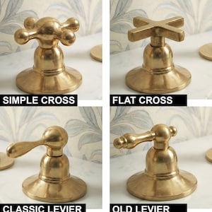 May include: Four brass faucet handles with a metallic finish. The top left is labeled SIMPLE CROSS, the top right is FLAT CROSS, the bottom left is CLASSIC LEVIER, and the bottom right is OLD LEVIER. Each handle features a circular base.