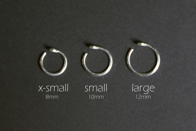 silver lip cuff sizing chart. Extra small 8mm, small 10mm, and large 12mm. No piercing required