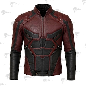 May include: A burgundy and black leather jacket with a stand-up collar and a zipper closure. The jacket features black panels on the chest, shoulders, and sleeves. The sleeves are black leather. The jacket has a textured pattern on the burgundy leather.