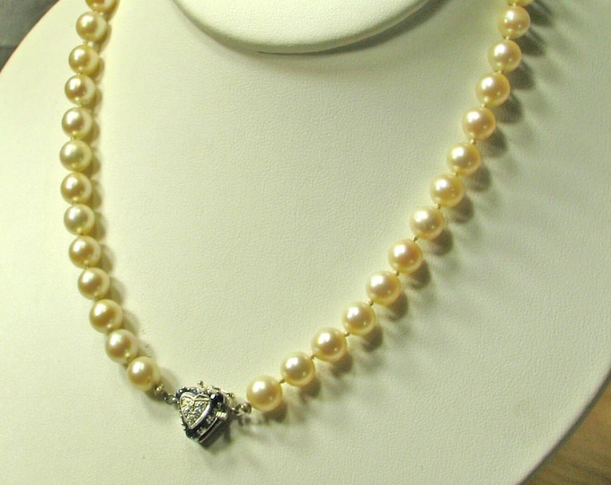 Cream Saltwater Pearls with Beautiful Sapphire and Diamond Clasp