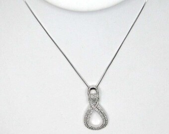 10K White Gold Eternity Pendant with Diamonds