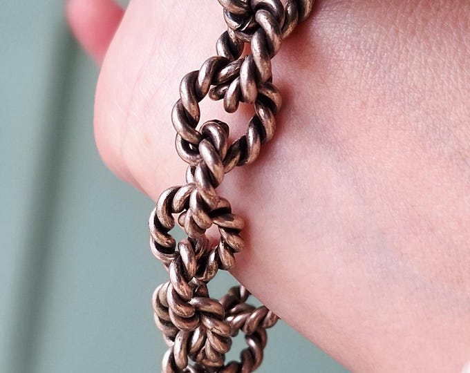 Silver Tone Twisted Link Bracelet with Decorative Ball Charms