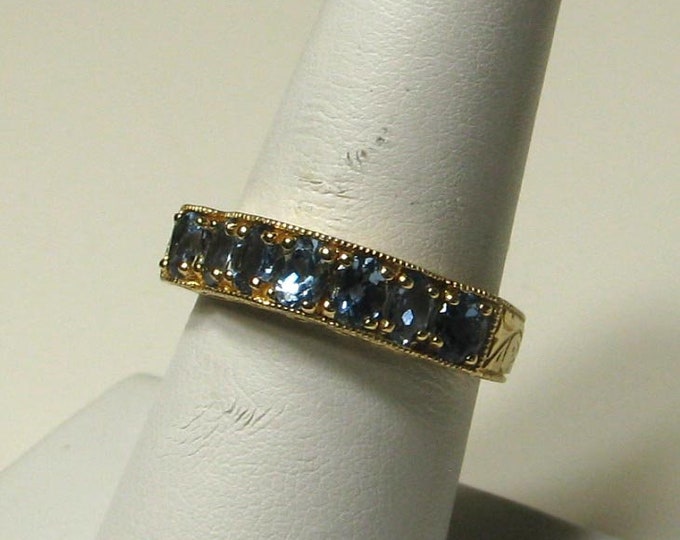 14K Yellow Gold Oval Blue Topaz Band
