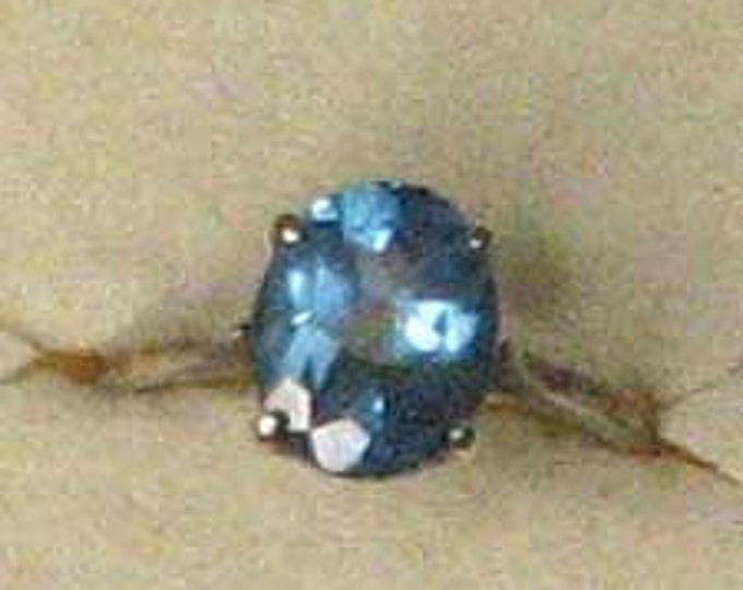 Classic Oval Blue Topaz Ring