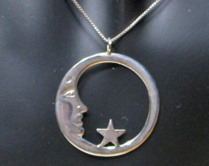 Moon and Star Circle Pendant in Sterling Silver