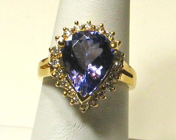 Quality 18KY Tanzanite and Diamond Ring
