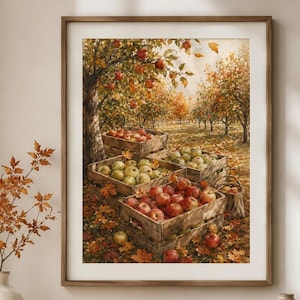 Könnte beinhalten: Ein gerahmter Kunstdruck, der einen herbstlichen Obstgarten mit Holzkisten voller roter und grüner Äpfel zeigt. Das Bild zeigt Bäume mit orangefarbenem und gelbem Laub, gefallene Blätter auf dem Boden und ein warmes, goldenes Licht.