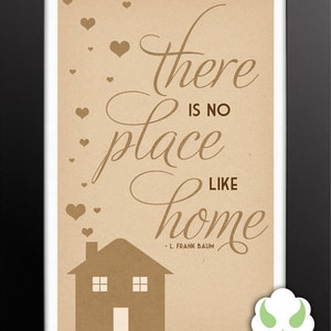 May include: A brown and white printable quote with the text "There is no place like home - L. Frank Baum" with a small house illustration and hearts in the background.