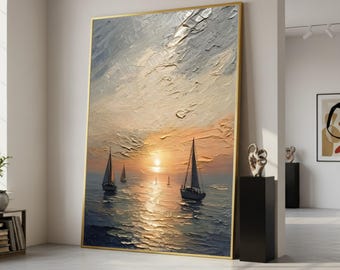 May include: Large framed oil painting depicting sailboats on the ocean at sunset. The artwork features a textured, impasto style with a golden frame. The sky transitions from light blue to orange and yellow.