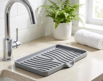 Jabonera de silicona con boquilla de drenaje: bandeja autodrenante para encimeras de cocina y baño.