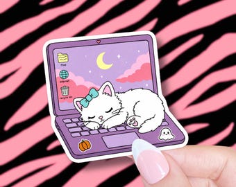 cat sleeping on laptop sticker
