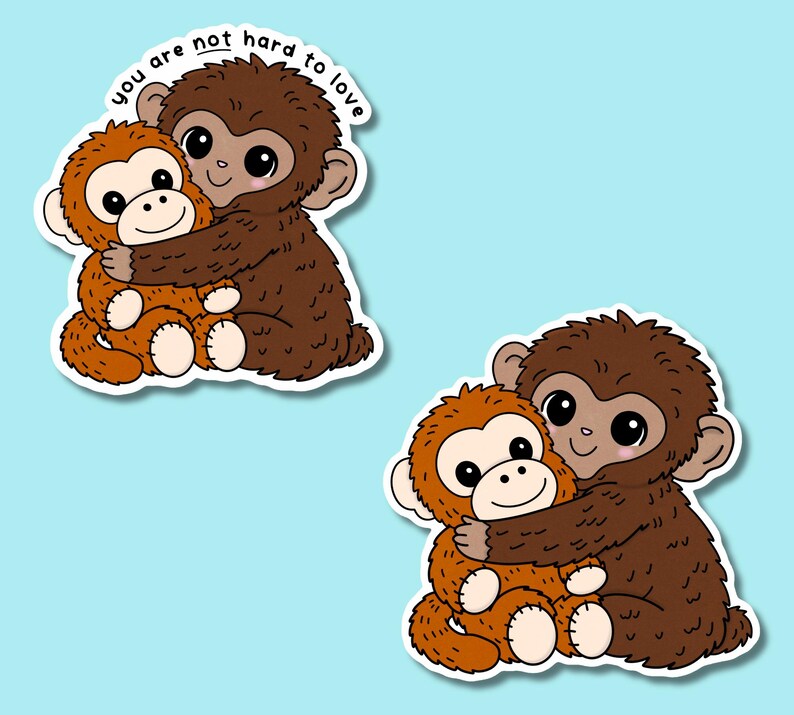 May include: Two stickers featuring cartoon monkeys hugging. One monkey is brown, the other is orange. The text "you are not hard to love" is above the monkeys. The stickers are on a light blue background.