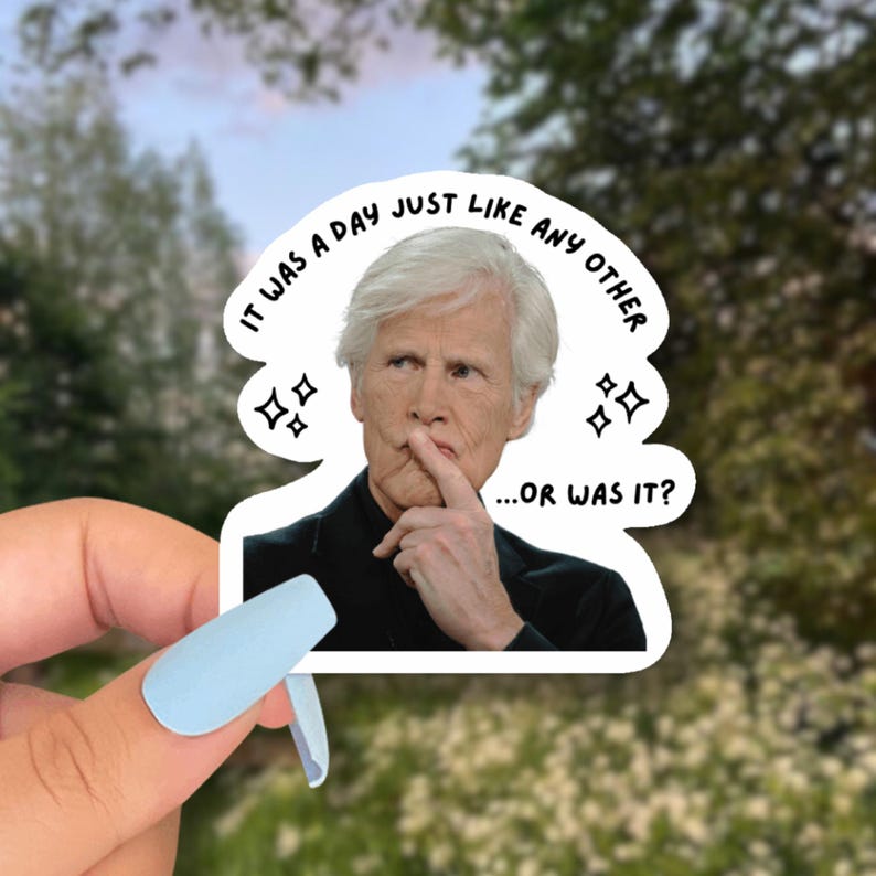 May include: A white sticker featuring a man with white hair and a finger on his lips. The sticker has the text "IT WAS A DAY JUST LIKE ANY OTHER...OR WAS IT?" in a speech bubble design with star accents.