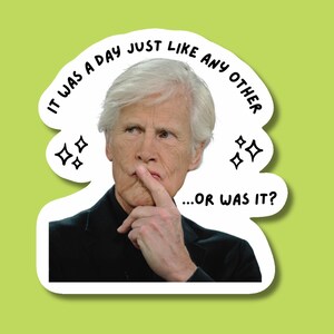 May include: A die-cut sticker featuring a man with white hair and a black jacket, with a finger on his lips. The sticker has the text "IT WAS A DAY JUST LIKE ANY OTHER...OR WAS IT?" and star graphics.