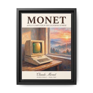 May include: A framed canvas print featuring a painting of an Apple II computer. The artwork, titled "MONET," includes the text "APPLE II COMPUTER IN THE CALIFORNIA SUNRISE." The painting is signed "Claude Monet" and includes "MUSÉE D'ORSAY - PARIS, 75007."