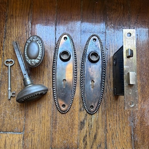 Antique Copper Finish, Oval Bead Door Knobs & Backplates Complete Door Hardware Set