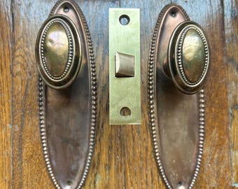 Antique Brass Door Hardware Set Oval Bead Door Knobs, Backplates, & Latch