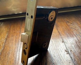 Cerradura reversible antigua para puerta de entrada Russwin Modelo 1248 (distancia entre ejes de 2-1/2”)
