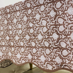 Soft cotton Mud Brown hand block print tablecloth featuring elegant floral patterns and matching piping edges arranged in a bright dining room setting. This farmhouse-inspired reusable table linen adds warmth and texture to kitchen tables, wedding receptions, festive meals, casual brunches, and rustic boho home décor while showcasing traditional handmade artistry.