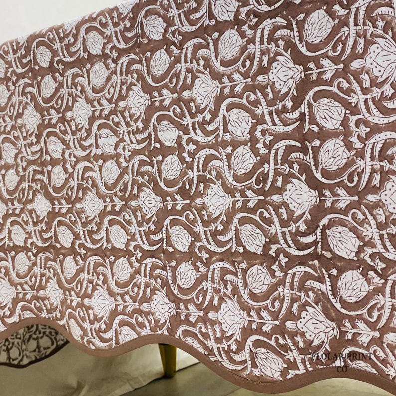 Soft cotton Mud Brown hand block print tablecloth featuring elegant floral patterns and matching piping edges arranged in a bright dining room setting. This farmhouse-inspired reusable table linen adds warmth and texture to kitchen tables, wedding receptions, festive meals, casual brunches, and rustic boho home décor while showcasing traditional handmade artistry.