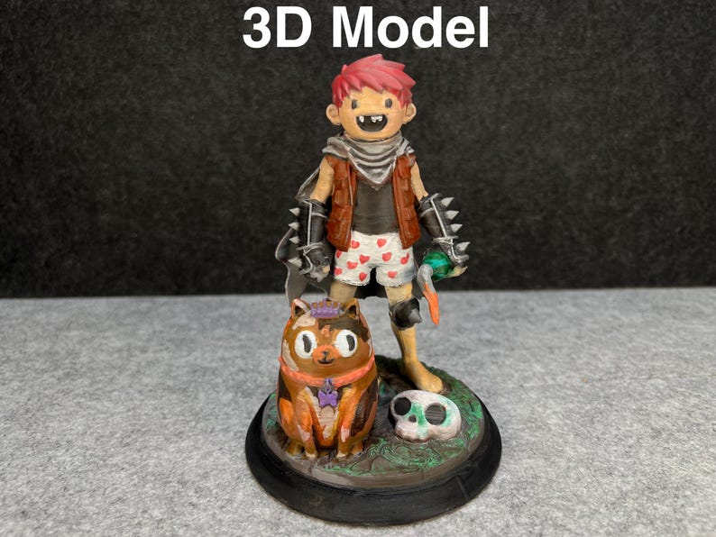 Op de afbeelding: Een 3D-modelfiguur van een stripfiguur met rood haar, gekleed in een bruin vest, een korte broek met hartpatronen en stekelige handschoenen. Een kattenbeeldje en een schedel staan ook op de basis. De tekst "3D Model" staat bovenaan.