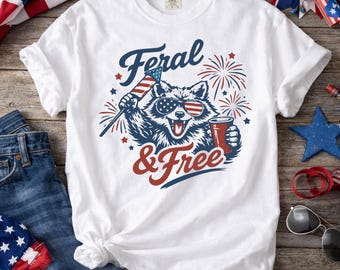 Camiseta patriótica de mapache libre y salvaje para el 4 de julio, camiseta divertida de mapache con fuegos artificiales, camiseta gráfica de verano de EE. UU. para el Día de la Independencia.