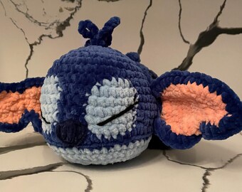 Sleepy blue stitchy alien