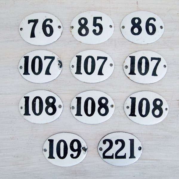 vintage black and white enamel number signs