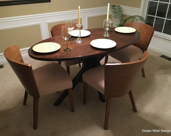 The Montego Oval Modern Walnut Dining Table