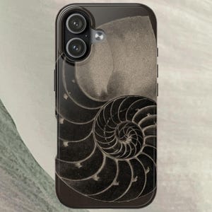 May include: Black phone case featuring a sepia-toned nautilus shell design. The case has a glossy finish and a dark border, with a dual-lens camera cutout at the top. The spiral shell pattern is a prominent feature.